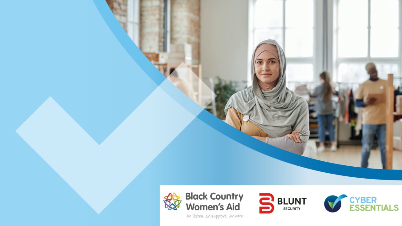 Illustrative picture of a woman standing at the front of an office with arms folded. There is a logo of Black Country Womens Aid and Blunt Security at the bottom.